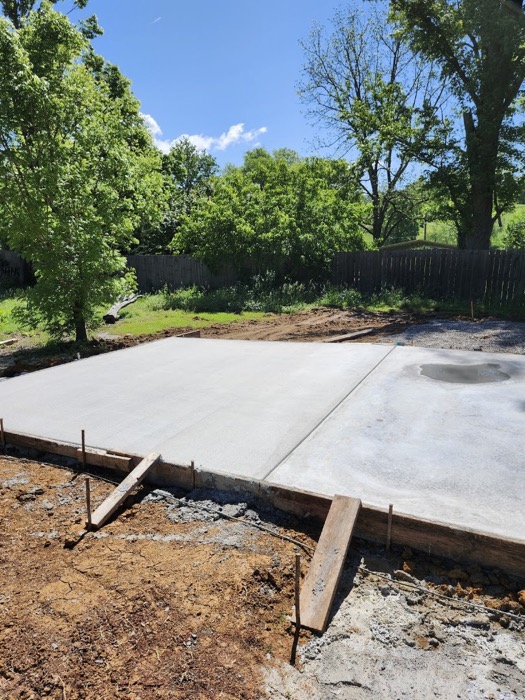 A finished concrete driveway poured by T. Archer Concrete