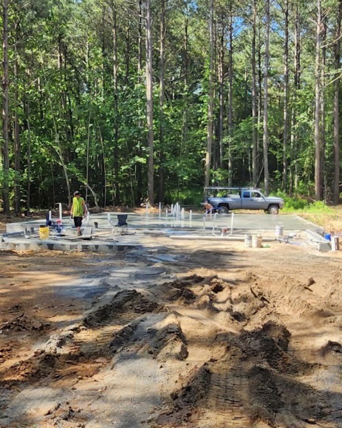 Tim Archer's crew setting up a slab pour on a wooded lot near Friendsville, Tennessee