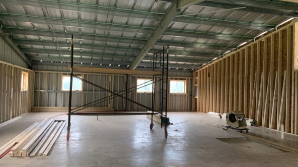 A finished shop slab inside a pole barn