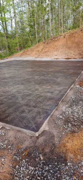 Stamped concrete detail with a deep stained color