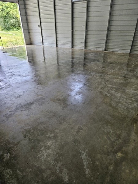 A freshly finished stamped concrete surface, still wet