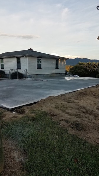 A freshly poured and floated concrete slab
