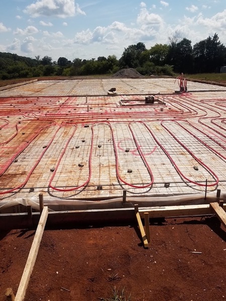 Heating tubing laid over a prepared slab base